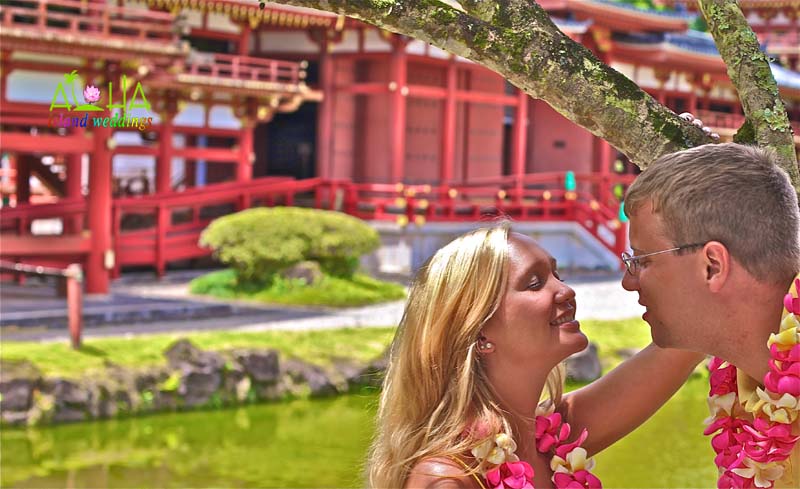 closing her eyes for a kiss in Hawaii